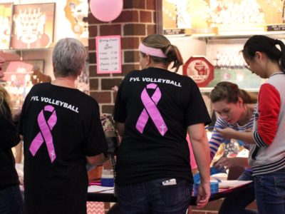 Fans line up to buy tickets to try to win their favorite baskets.
