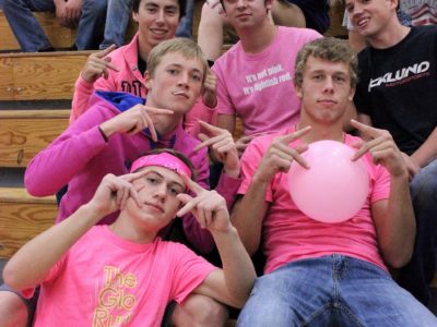 Some of our senior boys enjoy sporting their pink at the match.